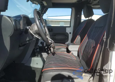 2010 Jeep Wrangler Rubicon z USA, uszkodzony, nr VIN 1J4BA6D18AL221240